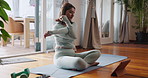 Woman, yoga and stretching with tablet for tutorial, online class or fitness lesson on mat at home. Young female person or yogi in warm up with technology for exercise tips, training steps or workout