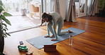 Woman, tablet and browse for pilates, tutorial and online video stream with fail. Influencer, social media and internet for yoga, fitness or workout research with exercise podcast at home or house