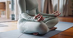 Yoga, meditation and hands of woman in home for wellness, peace and mindfulness on mat. Pilates, mental health and person with lotus pose for exercise, calm and spiritual mindset in living room