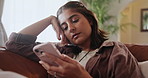 Woman, cellphone and online stream with internet, browse and social media for networking. Bored student, technology or remote education for research, video or podcast for learning or study with music