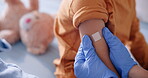 Child, arm and pediatrician hand with bandage for immunization shot or assessment, healthcare or checkup. Kid, clinic and helping consultation with medical testing or youth job, diagnosis or plaster