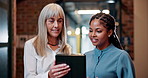 Business woman, CEO and intern with tablet for coaching, research or online browsing at office. Female person, executive or manager talking to junior designer on technology for discussion in hallway