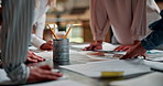 Meeting, desk and hands of business people for design, pattern and color for advertising agency. Creative company, teamwork and workers with documents for planning, collaboration and ideas in office