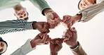 Business people, fist bump and hands together with motivation, collaboration or mission below on white background. Low angle or closeup of young employees touching for teamwork, unity or solidarity