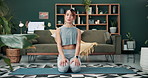 Woman, yoga and tutorial with influencer on mat in living room for exercise, workout or pilates at home. Portrait of young female person, vlogger or yogi talking for healthy tips, fitness or wellness