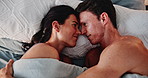 Love, peace or couple in bed with hug, trust or wake up bonding, safety or support in top view home together. Commitment, marriage and people embrace in bedroom calm, relax or connection in a house