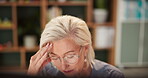 Mature woman, computer and headache for stress in office, glasses and CEO fatigue or mental health. Female person, reflection and employee burnout at workplace, anxiety and frustrated for mistake