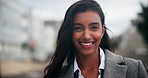Portrait, happy and business woman in city with wind in hair, confidence and professional worker in India. Face, entrepreneur and smile of agent in urban town outdoor for travel and morning commute