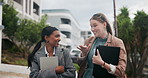 Business woman, friends and walking with tablet in neighborhood for friendly discussion to work. Happy female person or young employees talking with documents and technology for travel in urban town