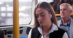 Earphones, music and woman in bus, relax and travel in morning to work, public transport and city. Vehicle, traffic and female employee with headphones, podcast and streaming online in New York