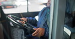 Bus, driver and driving on road for transportation or commute passengers, trip and journey for public transit. Black man, steering wheel and control of vehicle for safety, route and motion for travel