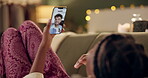 Woman, relax and video call at night in home with virtual connection to man online with phone. Smartphone, chat and girl on sofa talking to friends with internet, app or live streaming discussion