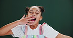 Child, yawn and tired girl in studio with fatigue on dark background, mockup and space. Sleepy, kid and portrait with lazy low energy from boring school, class or adhd student with gesture for rest 