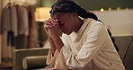 Black girl, worship or pray on sofa in home for solace or devotion, spiritual connection and wellness gratitude to god. Woman, eyes closed and prayer to higher power for praise or hope and christian.