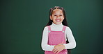 Happy, kid and face of girl in studio on green background and back to school with excited energy. Education, portrait and child on academy mockup or creative gen z student with style or fashion