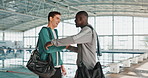 Friends, handshake and embrace for hello, community or greeting hug at swimming pool. Sports, swimmer and athlete men meeting for training challenge, fitness or hangout after morning workout together