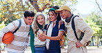 Friends, talking and smile for phone in park, conversation and online for gossip in post and social media. Gen z, men and women in nature, watch and outdoor for funny video, happy and students