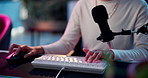 Girl, hands and gaming with computer at night for entertainment, video games or esports at home. Closeup of female person or gamer playing late on desk for online streaming, competition or tournament