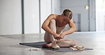Girl, shoes or ribbon on floor for ballet performance, getting ready or dance practice in studio. Ballerina, artist or dancer in art academy prepare for stage show, exercise or creative school on mat