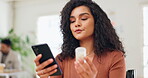 Medicine, phone and research with business black woman reading dosage information in office. Container, pills and technology with employee on medical website for online pharmaceutical instructions