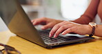 Hands, laptop and typing with business employee closeup in office for administration, report or research. Computer, internet and technology with person at desk in workplace for email or information