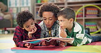 Children, book and bonding on floor at school, learning and literacy knowledge or mind development. Boys, kids and storytelling for education, english and literature information on mat for language