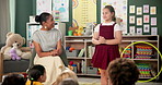 Classroom, education and teacher with kid student or presentation, teaching and public speaking support. Learning, school or woman with girl for speech, help or guide to self confidence development