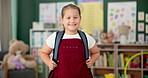 Smile, face and child in classroom for education, learning and ready for morning kindergarten. Happy, school and portrait of girl or student with knowledge, studying and pride for academic lesson