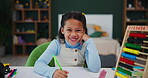 Girl, face and happy with school, writing and assignment for education and learning. Excited student, classroom and mad for knowledge, homework and mental development for skills and kindergarten