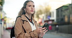City, business woman and smartphone waiting for transport, taxi and check schedule on phone. Female journalist, scroll and mobile conversation with cellphone, worried and commute to job in morning