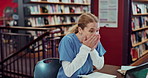 Woman, surprised and student with laptop in library for education, good news or positive test results. Happiness, wow and excited female person for scholarship, celebration or medical internship