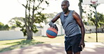 Black man, training and practice at basketball court for playing, exercise and sport for fitness in Atlanta. Athlete, healthy and workout for competition as player with passion for career in outdoor 