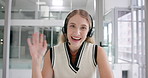 Woman, call centre and face in office, waving and receptionist or assistant service greeting. Female person, professional and customer care hotline with headset, agent portrait and consultant help