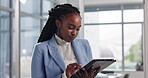 Tablet, business and black woman in office for project review, networking or reading report. Professional, online and employee at advertising agency for internet browsing, planning or schedule update