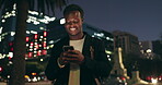 Night, walking and black man with mobile phone in city for communication, social media or networking. Smile, contact and happy man with smartphone for texting, online notification or typing post