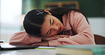 Tired girl, laptop and sleeping with documents for homework, study or research assignment on desk. Lazy, bored or female person, student or learner resting or asleep in fatigue on table with computer