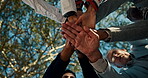 Business people, team building and meeting with stack of hands in nature for support, deal or success. Corporate, employee and low angle with celebration in park for motivation, solidarity or winning