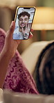 Video call, home and couple talking on sofa with smile for discussion, chatting and social networking. Communication, dating and man and woman on smartphone for conversation, speaking and bonding