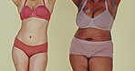 Dance, body and women in underwear for inclusion in studio isolated on a green background. Positivity, friends in lingerie and diversity, beauty of different plus size people together and acceptance