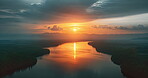 Drone, view and river in nature with sunset for tranquility or peaceful, relaxing and tropical rainforest for adventure. From above, amazon and lake with sunrise reflection in morning for new dawn.