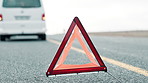 Car, road and warning triangle for accident, vehicle breakdown or assistance alert in nature. Minibus, safety and hazard symbol or sign on street for warning, attention or signal in countryside.