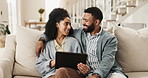 Happy couple, relax and browsing with tablet on sofa for interior design, planning or discussion at home. Man and woman talking with smile on technology for scrolling or reading news in living room