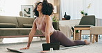 Black woman, calm and yoga in home with tablet for online class, meditation video and pose tutorial for stretching. Girl, internet and breathing in living room with pilates for mental health and zen.