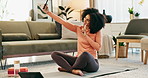 Home, woman and selfie with peace sign before fitness, exercise and yoga in living room. Apartment, female yogi and blow kiss for profile picture, photography and social media post in lounge