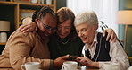 Embrace, smartphone and senior woman in living room of nursing home for memories. Smile, discussion and group hug of elderly friends in retirement talking, bonding and relaxing in house with coffee