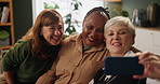 Selfie, smile and senior woman in living room of nursing home for communication. Happy, discussion and group hug of elderly friends in retirement talking, bonding and relaxing in lounge at house