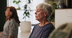 Senior woman, group and yoga class with breathing, peace and meditation for reflection in retirement. Elderly person, mindfulness and zen perspective with eyes closed for wellness in nursing home