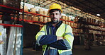 Man, face and logistics warehouse for distribution, inspection and inventory management for supply chain. Male employee, serious arms crossed with confidence in factory for freight, storage and cargo