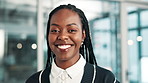 Black woman, portrait and happy in office with pride or proud for career or job growth as accountant. Female person, confidence and satisfied or smile for internship opportunity as employee at work