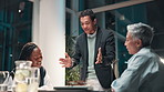 Businessman, meeting and office with discussion at night, excited with proposal for company strategy. Male accountant, coworking and conference room with hands for wow, dark with finance conversation